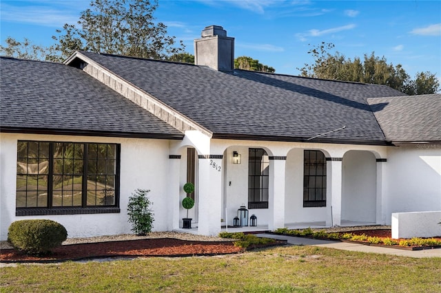 view of front of home with a front yard