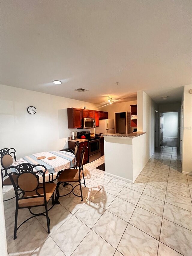 dining space featuring visible vents