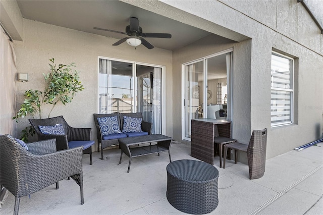 2881 Kokomo Loop, Haines City, FL 33844 - view of terrace with outdoor lounge area and ceiling fan