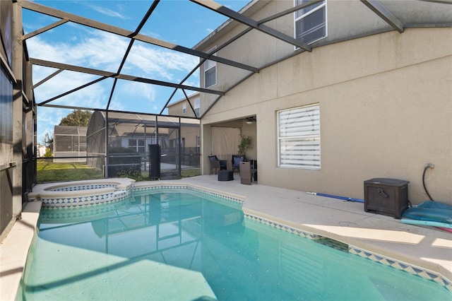 2881 Kokomo Loop, Haines City, FL 33844 - view of pool featuring an in ground hot tub, a lanai, and a patio