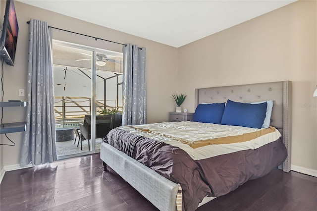 2881 Kokomo Loop, Haines City, FL 33844 - bedroom with dark hardwood / wood-style flooring and access to exterior