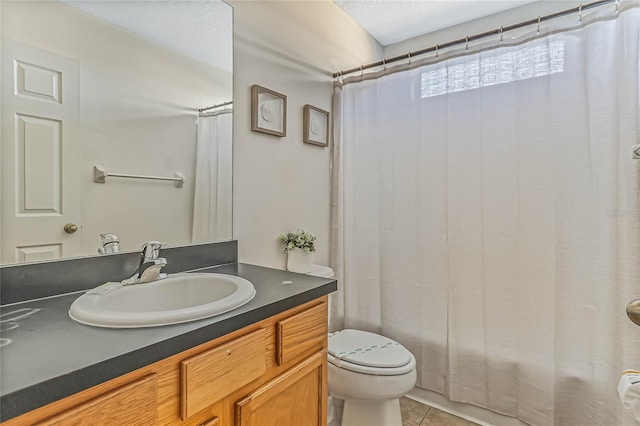 2881 Kokomo Loop, Haines City, FL 33844 - bathroom with toilet, tile floors, and vanity with extensive cabinet space