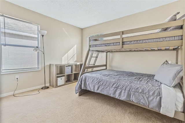 2881 Kokomo Loop, Haines City, FL 33844 - carpeted bedroom featuring a textured ceiling