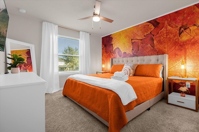 bedroom with light carpet and ceiling fan