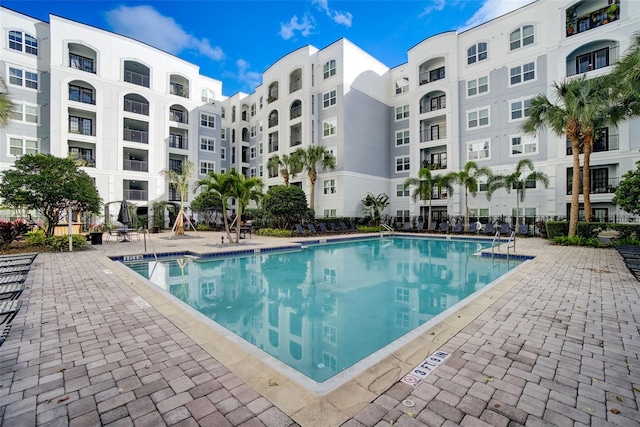 view of pool featuring a patio