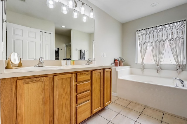 bathroom featuring tile floors, a washtub, and dual bowl vanity