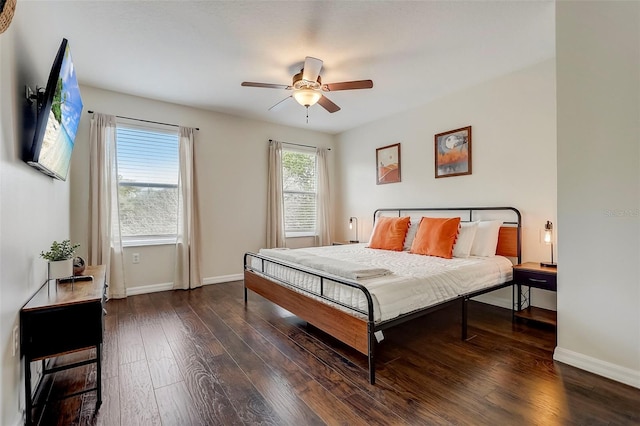 bedroom featuring ceiling fan and dark hardwood / wood-style flooring