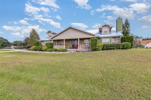 view of front of house featuring a front yard and covered porch