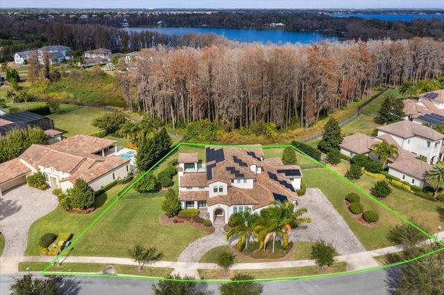 drone / aerial view with a water view