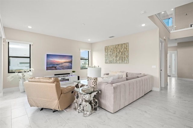 living room featuring light tile floors