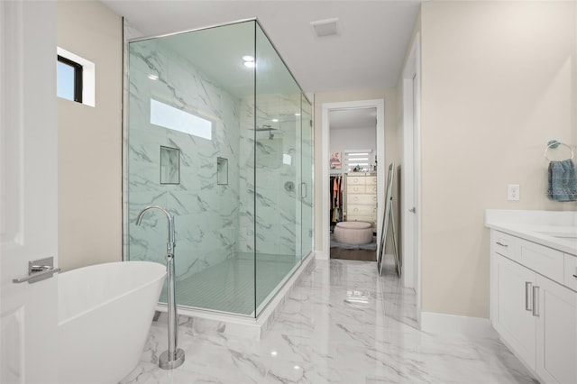 bathroom with vanity, plus walk in shower, and tile flooring