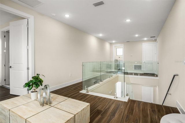 kitchen with dark wood-type flooring