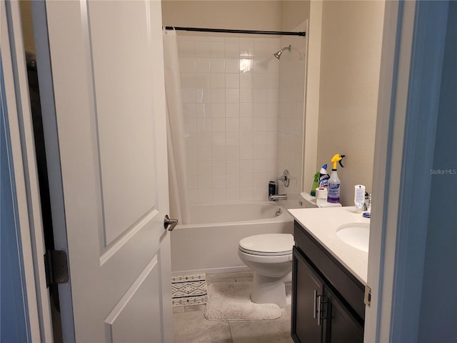 full bathroom featuring shower / bath combination with curtain, toilet, vanity, and tile flooring