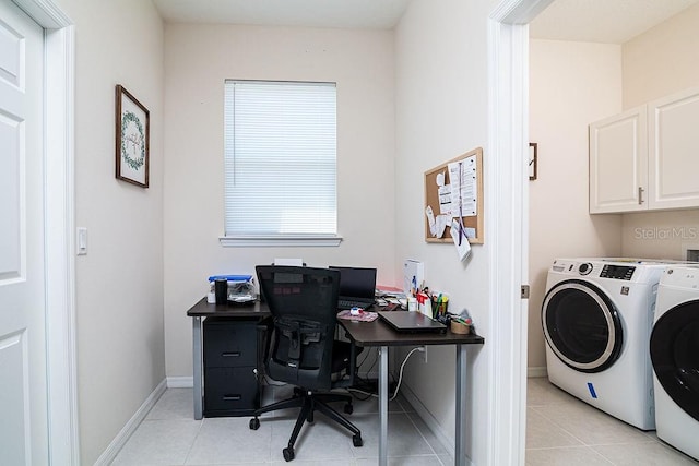 tiled office featuring separate washer and dryer