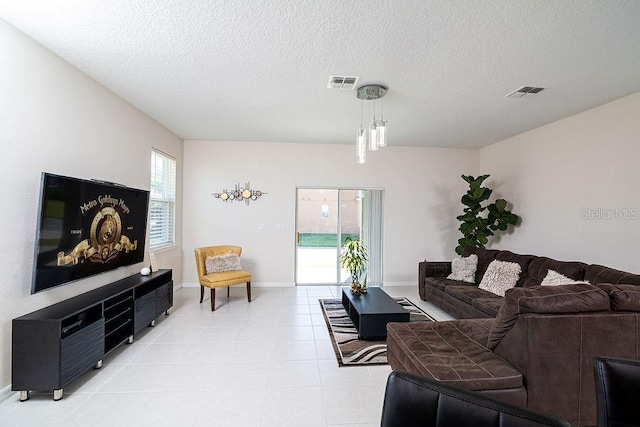 living room featuring a textured ceiling