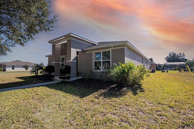 exterior space with a lawn