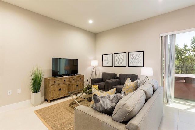 living room featuring light tile floors