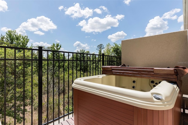 balcony featuring a hot tub