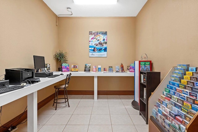 tiled office space featuring built in desk