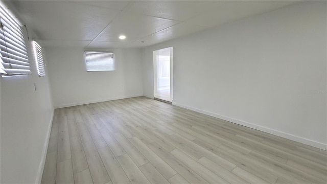 unfurnished room featuring light wood-type flooring