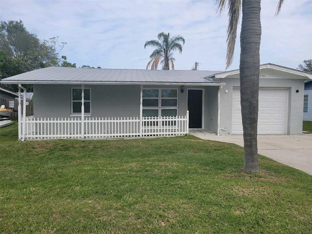 ranch-style house with a front lawn, covered porch, and a garage