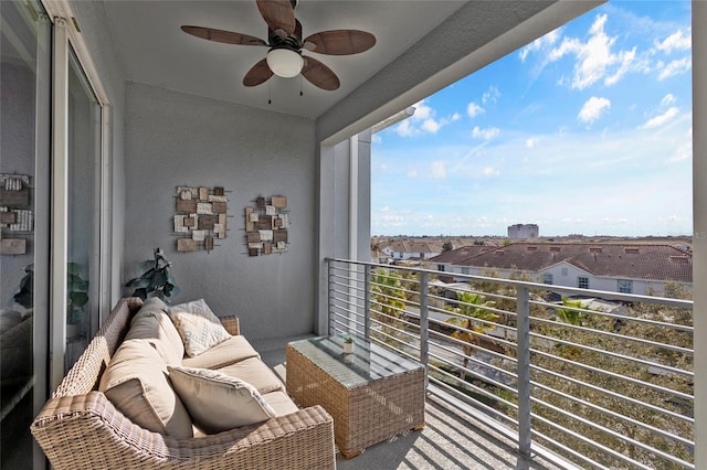 balcony featuring ceiling fan