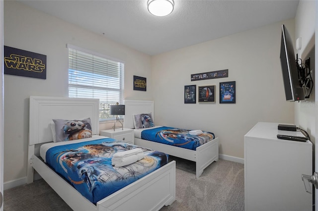 bedroom with light colored carpet