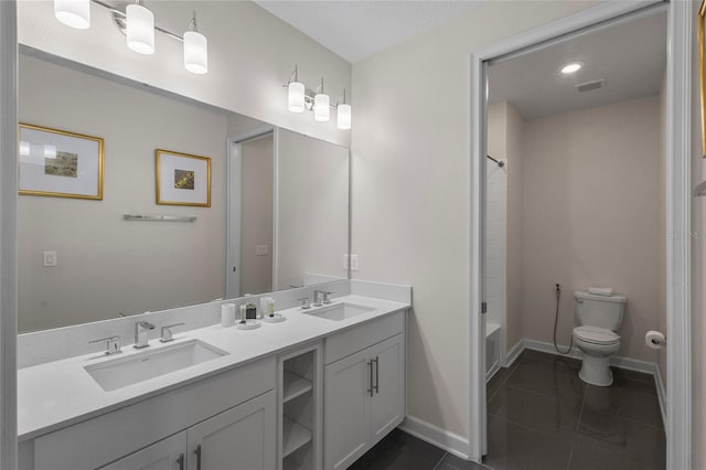 full bathroom with double sink vanity, tile flooring, bathtub / shower combination, and toilet