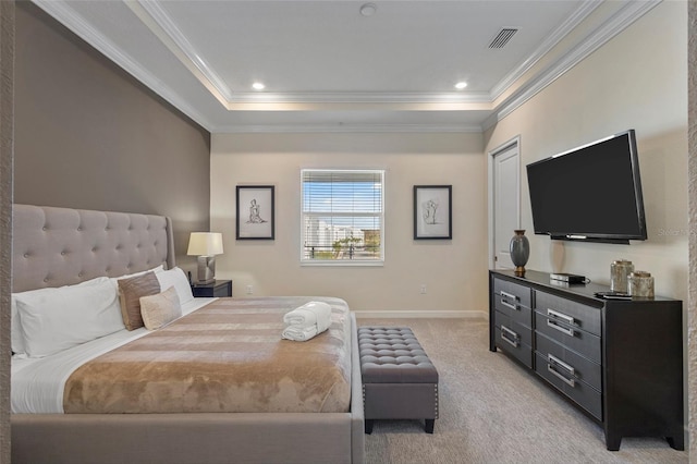 carpeted bedroom featuring a raised ceiling and ornamental molding