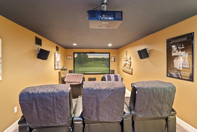 carpeted cinema with a textured ceiling