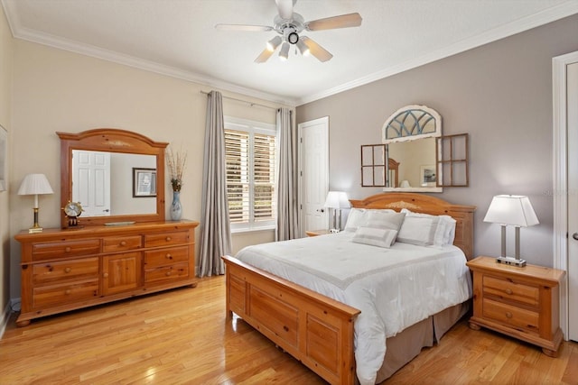 bedroom featuring ceiling fan, a closet, ornamental molding, and light hardwood / wood-style flooring