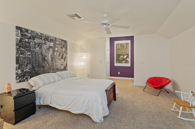 bedroom featuring ceiling fan, light colored carpet, and lofted ceiling