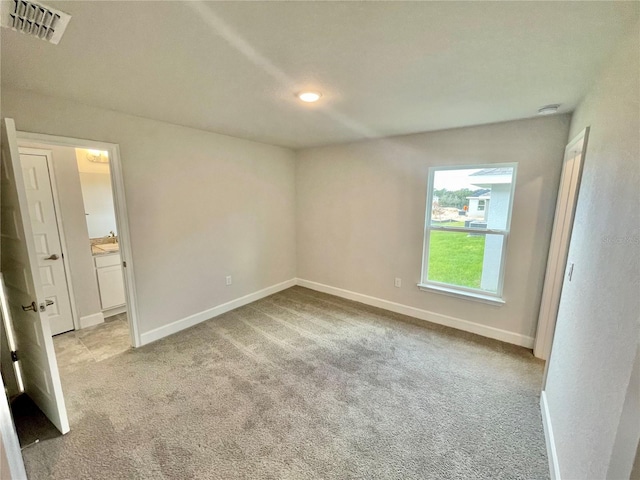 view of carpeted spare room