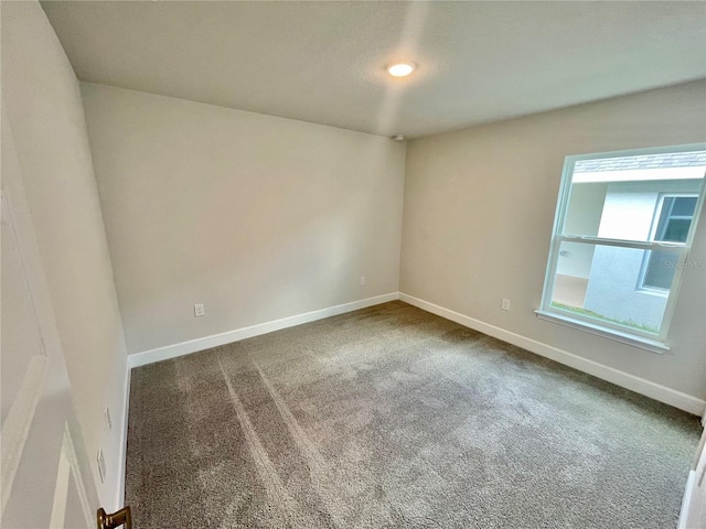 view of carpeted spare room