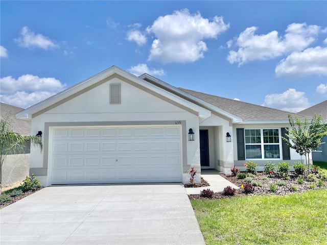 single story home featuring a garage