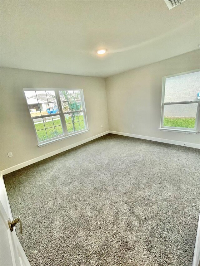 view of carpeted spare room