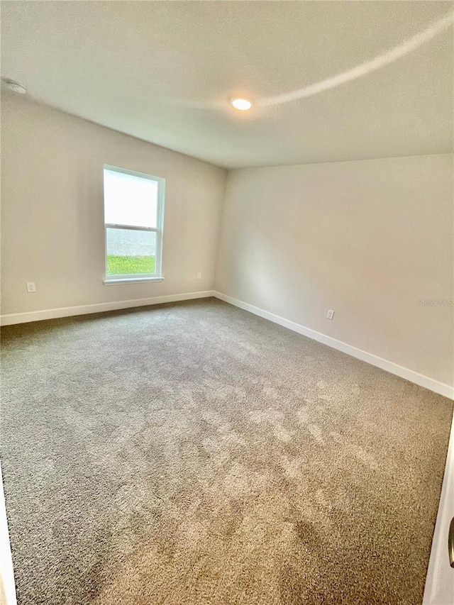 view of carpeted spare room