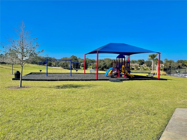 view of jungle gym featuring a yard