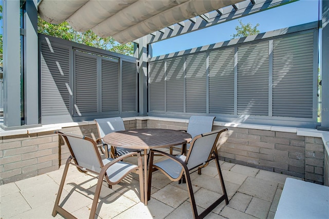 view of terrace with a pergola