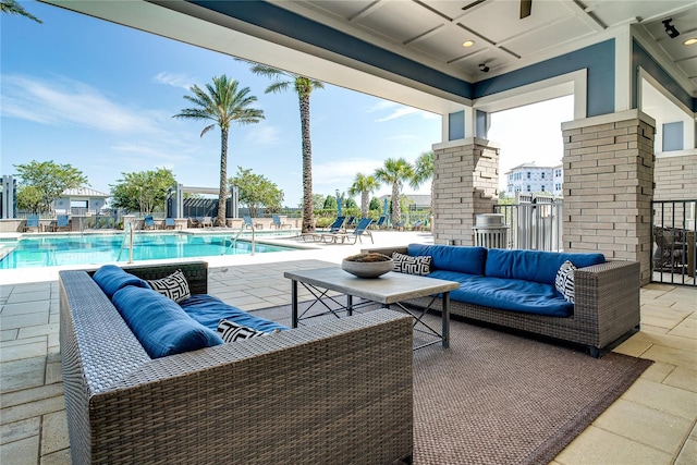 view of swimming pool featuring a patio area and an outdoor hangout area