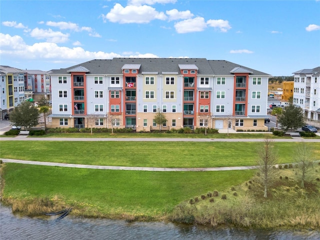 view of building exterior featuring a water view