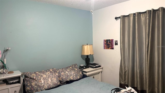 bedroom with a textured ceiling