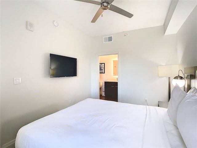 bedroom featuring ensuite bath and ceiling fan