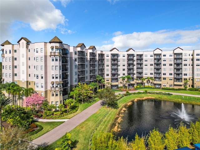 view of building exterior featuring a water view