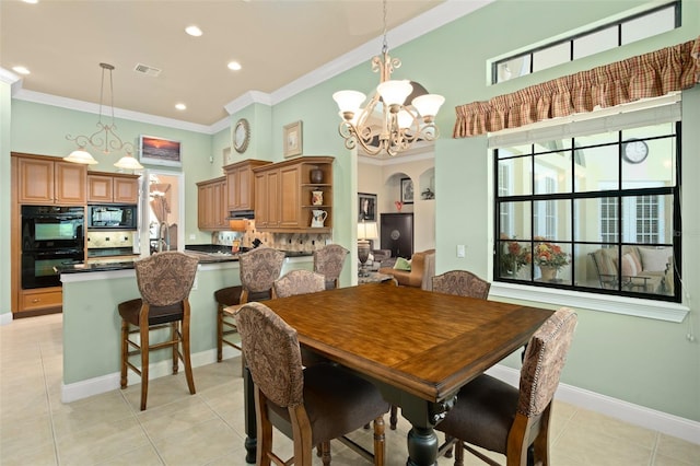 6443 Cartmel Ln, Windermere, FL 34786 - dining space featuring a chandelier, ornamental molding, arched walkways, and light tile patterned flooring