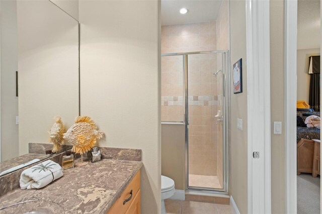 6443 Cartmel Ln, Windermere, FL 34786 - ensuite bathroom featuring a stall shower, ensuite bath, tile patterned flooring, and vanity