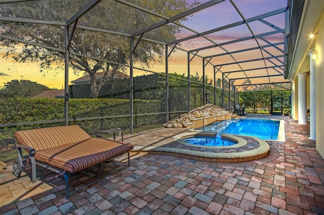 6443 Cartmel Ln, Windermere, FL 34786 - view of swimming pool with a lanai, a patio area, and a pool with connected hot tub