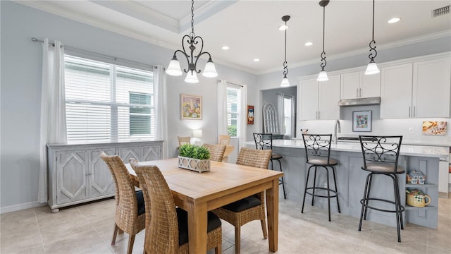 tiled dining room featuring crown molding and an inviting chandelier