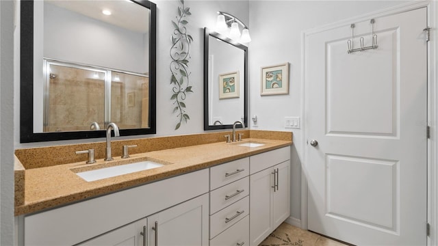 bathroom with double sink, tile flooring, and vanity with extensive cabinet space