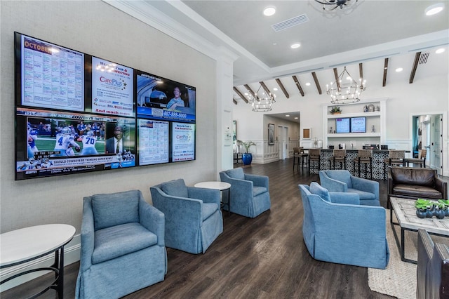 living room featuring a notable chandelier, vaulted ceiling with beams, and dark wood-type flooring